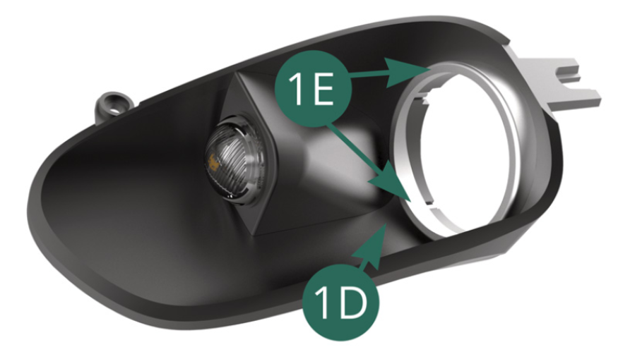 Position the left headlight trim 1E on the left headlight housing 1D. 