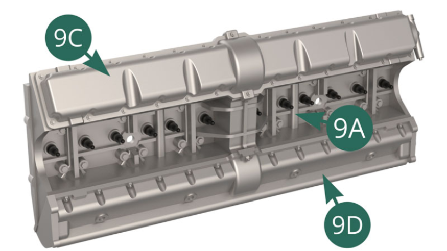 9C and 9D valve covers and 9B spark plugs installed on the right cylinder head. 