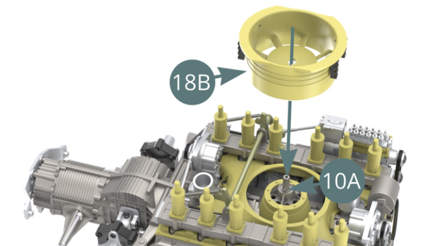 Position the fan housing 18B on the spindle shaft of the crankcase top 10A. 
