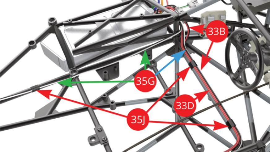 Guide the right fuel tank cable / black-red (33B), the switch cable / red (33D) and the longer (blue arrow) tail light LED cable / black-white (35G) along the right side of the frame, then tape them together on the main frame tube with two pieces of  tape (35J). Guide the shorter tail light LED cable / black-white (35G) - green arrow - along the left side of the chassis, then tape it to the main frame tube with one piece of tape (35J).