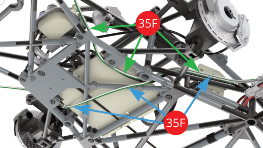 Identify the passage to the right of the longest (blue arrow) and to the left of the shorter (green arrow) of the headlight LED cables / white-green (35F) in the illustrations opposite.