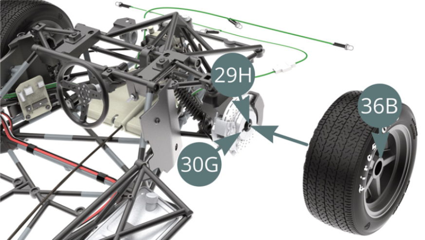 Position the rim of the left front wheel (36B) on the axle of the hub carrier (29H) by turning it gently until it engages the notch in the outer brake disc (30G). 