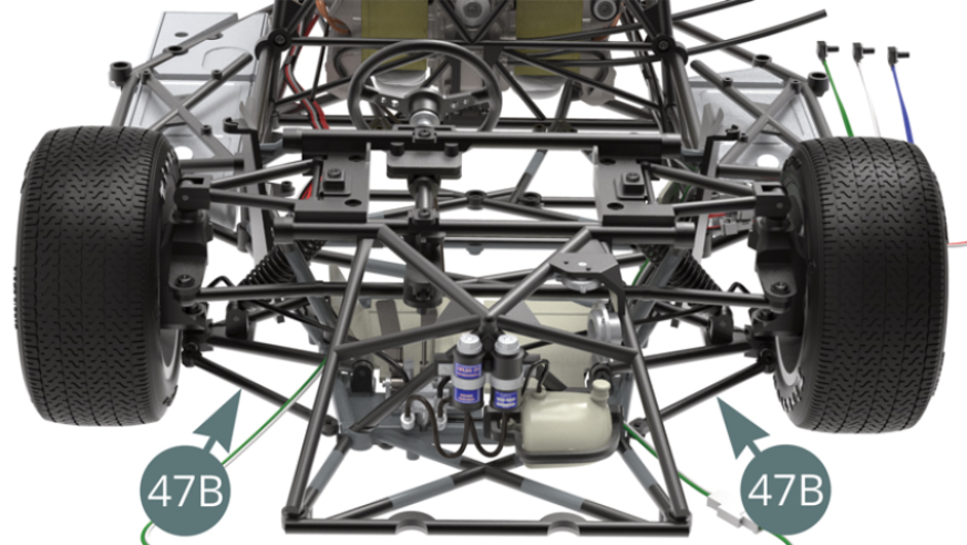 Front lower struts (47B) installed on the front suspension, top view