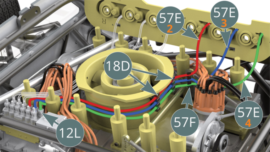 Pass the fuel lines (57E-2, 57E-3 and 57E-4) through the guide line (57F) and the two guide lines (18D) and position them on the three remaining injector nozzles (12L) of the inner row. Follow the red, blue and green order shown.