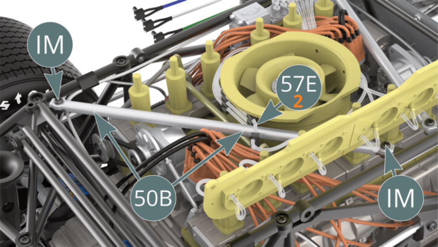 Replace the reinforcement bar (50B) by passing it under the fuel line (57E-2) - the highest one - and reattach it with two IM screws to the engine cradle.