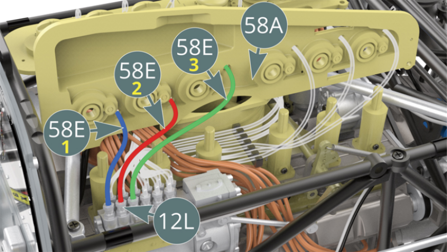Position the fuel lines (58E-1, 58E-2 and 58E-3) on the three remaining injector nozzles (12L) in the outer row. Follow the red, blue and green sequence as shown.