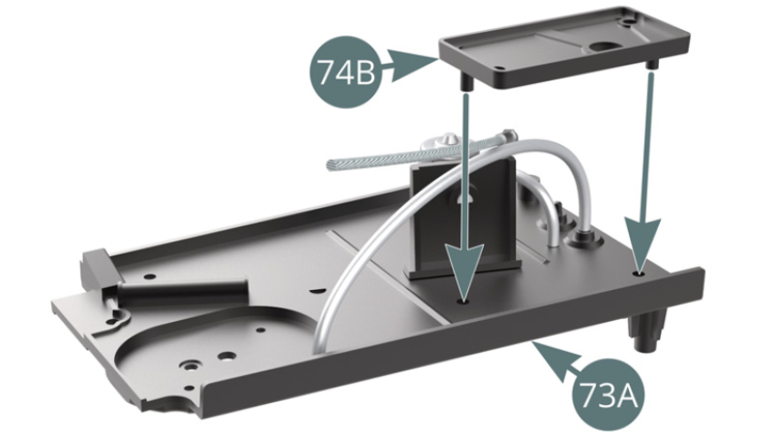 Position the battery holder (74B) on the right side platform (73A). Position the battery (74A) on the battery holder (74B).