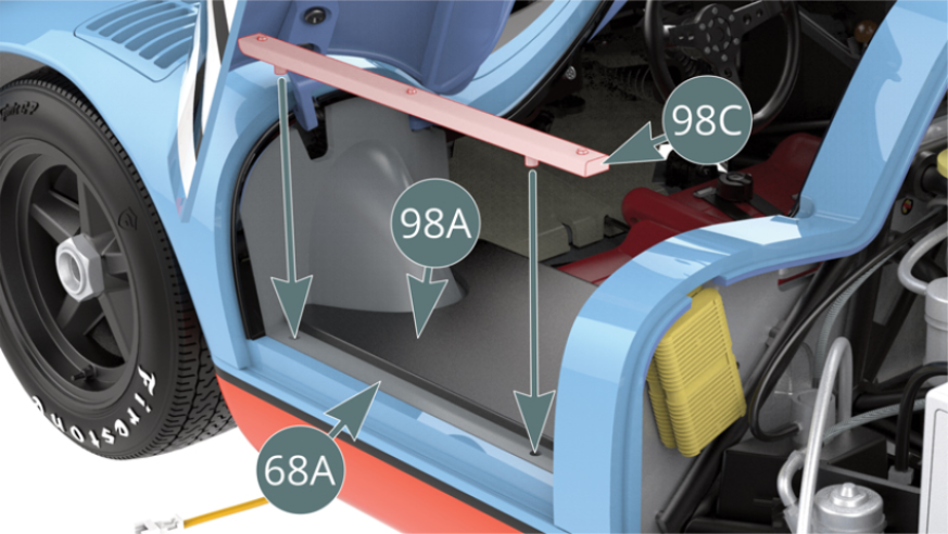 Fit the left trim strip (98C) along the edge of the left trim panel (98A) to the left cockpit housing (68A). With the left trim strip (98C) and left trim panel (98A) attached, proceed to close the left door.