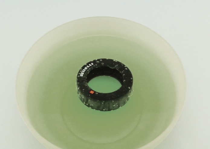 Immerse the tyre (15A) in warm water for 30 seconds in order to soften it.