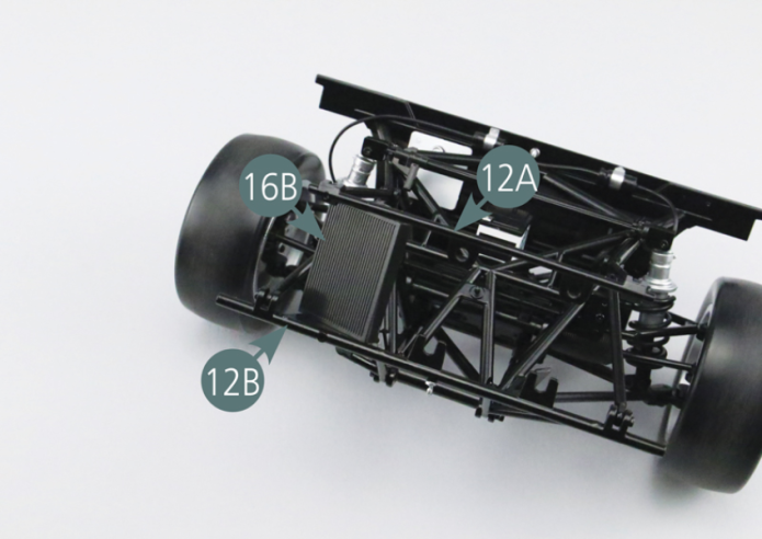 Position the radiator grille (16B) between the upper bar (12A) and the lower bar (12B) on the supports provided, then attach it from below to the lower bar (12B) by using two RP screws.