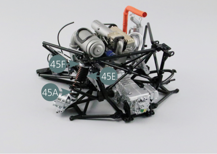 Position the rear suspension spring (45E) and the left rear hub (45A) as shown in the photo.