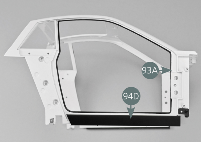 Position the left rocker panel (94C) into the three openings located on the lower left part of the body (93A) (below the door opening) as shown in the photo.