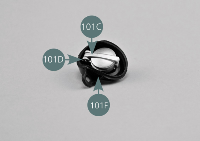 Place the fuel cap and its support in the cap housing (101F) and secure it from the rear with an AP screw as shown in the photo.