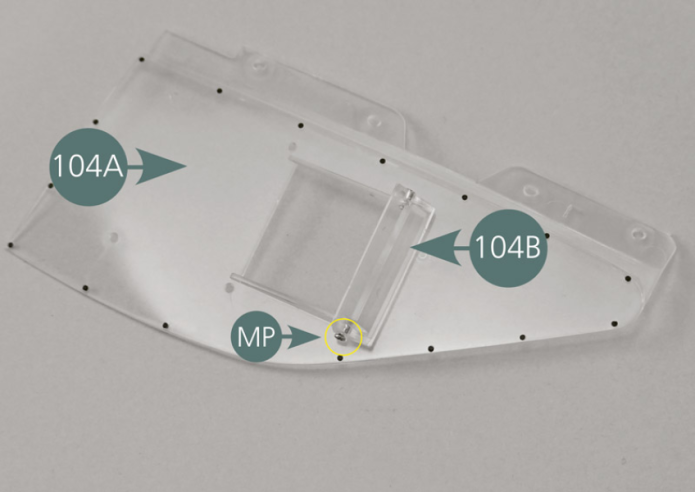 Position the deflector (104B) on the outside of the window (104A) and secure it with two MP screws as shown.