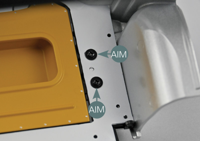Open the door hinge (103B) and position the pins opposite the three openings in the bodywork (93A) as indicated (yellow circles).