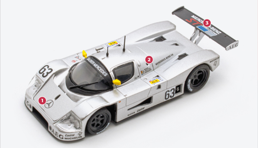 1 In 1989, Mercedes-Benz invested more resources in the Sauber programme. The C9s were painted in the Stuttgart firm's silver livery, with few sponsors on display, including AEG, a microelectronics company belonging to the Daimler-Benz group.2. The M119 engine on the C9, similar to the M117, benefits from 4-valve cylinder heads and improvements to the connecting rods, pistons and cooling.3. The configuration for Le Mans included a monoplane spoiler instead of a bi-plane and a different support from that used in other races.© IXO Collections SAS - Tous droits réservés. 