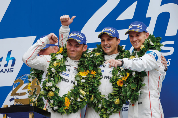 From left to right Nick Tandy, Earl Bamber and Nico Hülkenberg on the podium of the 2015 24 Hours, having won against all odds after a flawless race. © IXO Collections SAS - Tous droits réservés.