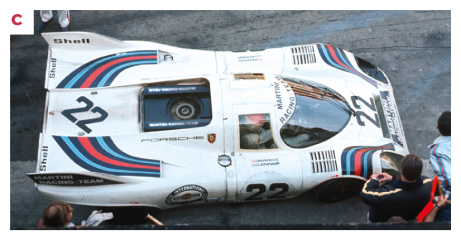 C. Il cofano lascia scoperta la parte superiore del motore e la grande ventola che aspira l’aria dal sottoscocca per tenere l’auto più incollata a terra. © IXO Collections SAS - Tous droits réservés. 