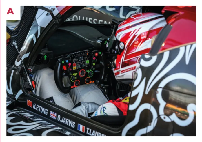 A. Driver Thomas Laurent checks all the parameters of his 07 with no. 38 on his multifunction steering wheel. The car is equipped with an XTrac sequential gearbox. © IXO Collections SAS - Tous droits réservés. 