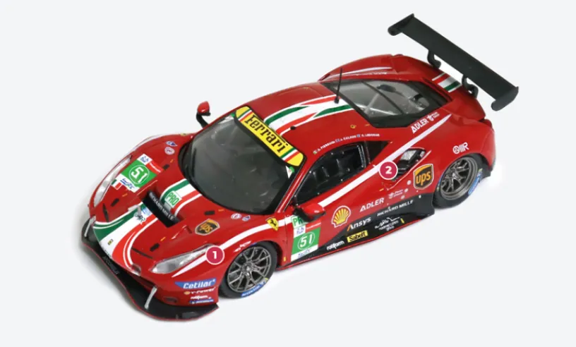 1. The main difference between the Evo and the original 488 GTE is the absence of pitch control deflectors on the nose, which were removed after several wind tunnel tests.2. Compared to the street model 488, the air intakes in the upper part of the flanks are larger and better designed to optimise airflow.© IXO Collections SAS - Tous droits réservés.