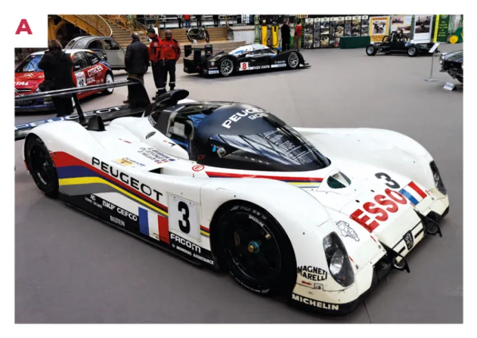B. Une 905 Evo 1 Bis LM en action lors de la course du Groupe C au Le Mans Classic en 2018.© IXO Collections SAS - Tous droits réservés.