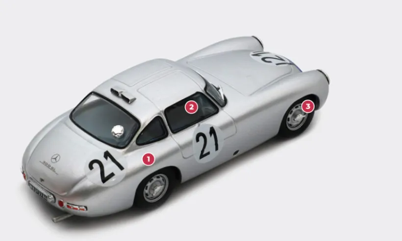 1. The tubular trellis structure that forms the chassis of the 1952 300 SL is very rigid, weighing just 50 kg. The car weighs no more than 900 kg, with the engine accounting for 265 kg.2. For a racing model, the W194's instrument panel is quite extensive. The comfortable seats are upholstered in an original tartan fabric. The steering wheel can be removed to facilitate access to the car.3. The steel wheels are secured with a single central wing nut, Rudge type.© IXO Collections SAS - Tous droits réservés.