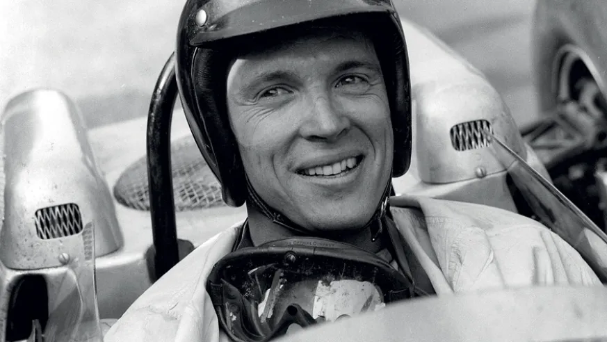 Der Amerikaner Dan Gurney nahm zwischen 1961 und 1962 an fünfzehn Grand Prix mit dem Porsche-Team teil, gewann ein Rennen und eine Poleposition (1962 in Frankreich bzw. Deutschland) und sicherte sich insgesamt fünf Podiumsplätze.© IXO Collections SAS - Tous droits réservés. 