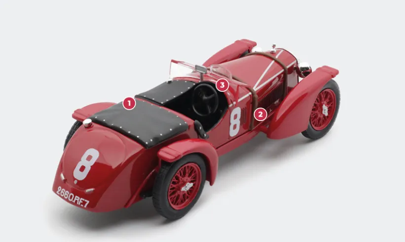 1. Even though race drivers sat alone in the car, regulations at the time required cars with engines larger than 1,100 cc to have four seats, which was common to both the MM and LM models, even though the front passenger seat and rear seats would remain covered.2. The compressor mounted on the right side of the engine near the intake is mechanically driven from the crankshaft when the accelerator is fully depressed.3. To reduce air resistance, the windshield remains folded down and a small windscreen protects the driver.© IXO Collections SAS - Tous droits réservés.&nbsp;