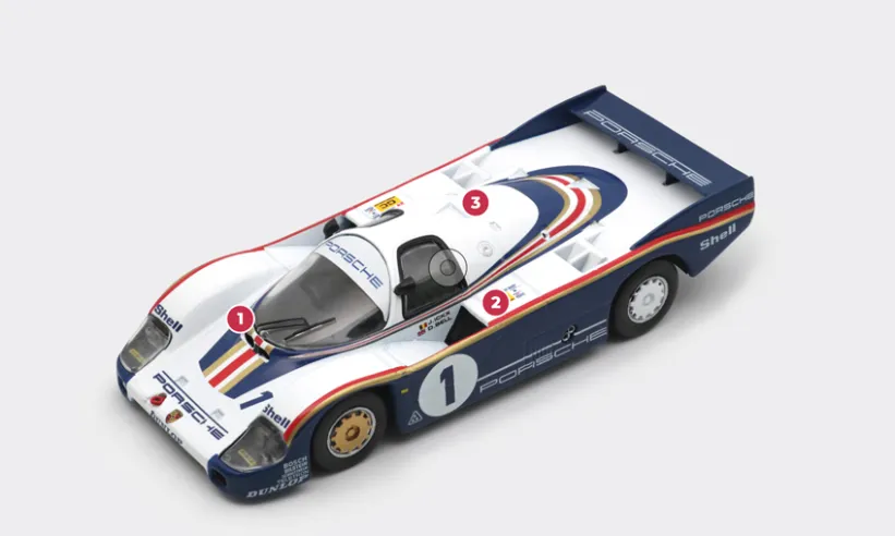 1. The main innovation of the 956 is its aluminium monocoque. At the front, the suspension is still directly attached to the main load-bearing structure, while at the rear it is anchored to a subframe.2. Airflow to the engine compartment and turbo heat exchanger is provided entirely by the large openings on either side of the driver's compartment, but otherwise the bodywork is ‘sealed’.3. The 2.65-litre boxer engine with two turbochargers and liquid-cooled cylinder heads comes from the previous 936 models. The initial power output of 620 hp will increase over the years to 640 hp with the arrival of Bosch electronic fuel injection.© IXO Collections SAS - Tous droits réservés. 