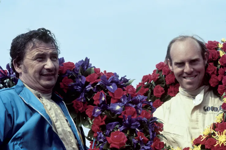 Hans Herrmann (left) and Richard Atwood, winners of Le Mans 24 Hours in 1970, Porsche's first overall victory at Le Mans. The German driver, born in 1928, already had four class victories in the French classic to his name. © IXO Collections SAS - Tous droits réservés.