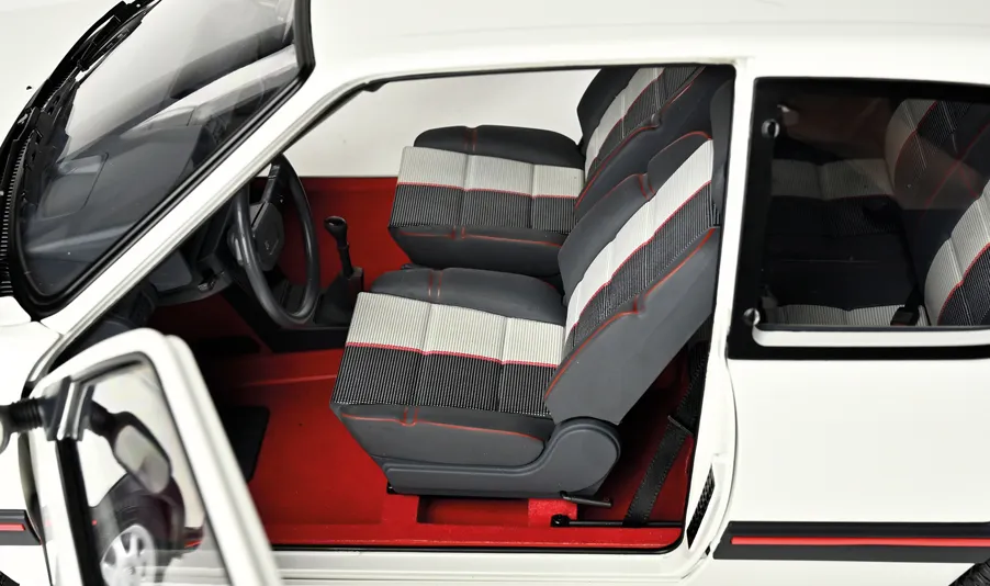 Rediscover the elegance of the Peugeot 205 GTI in its white livery