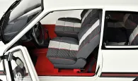 Rediscover the elegance of the Peugeot 205 GTI in its white livery